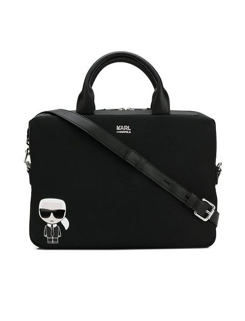 Тем, кто не любит излишнюю строгость в образе, предлагаем обратить внимание на сумку для ноутбука Karl Lagerfeld. Лаконичный и сдержанный дизайн делает ее уместной для делового дресс-кода...