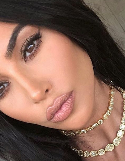 Ким Кардашьян злит, что она оказалась в тени Меган Маркл