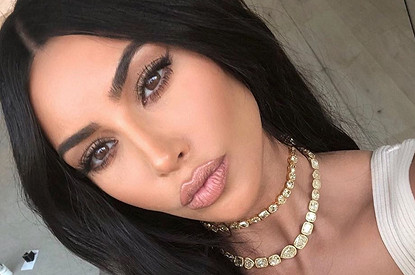 Ким Кардашьян злит, что она оказалась в тени Меган Маркл