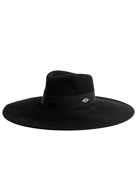 Если у тебя у шкафу висит черный плащ, то в пару к нему просится темная шляпа с широкими полями Tommy Hilfiger. Также она будет гармонично смотреться с верхней одеждой и пиджаками в мужск...