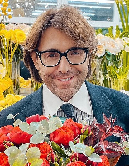 Андрей Малахов показал страстный поцелуй с Тиной Канделаки (видео)