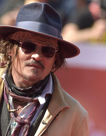 Джонни Депп празднует свою победу в суде над Эмбер Херд