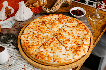 Как правильно есть хачапури в ресторане и дома